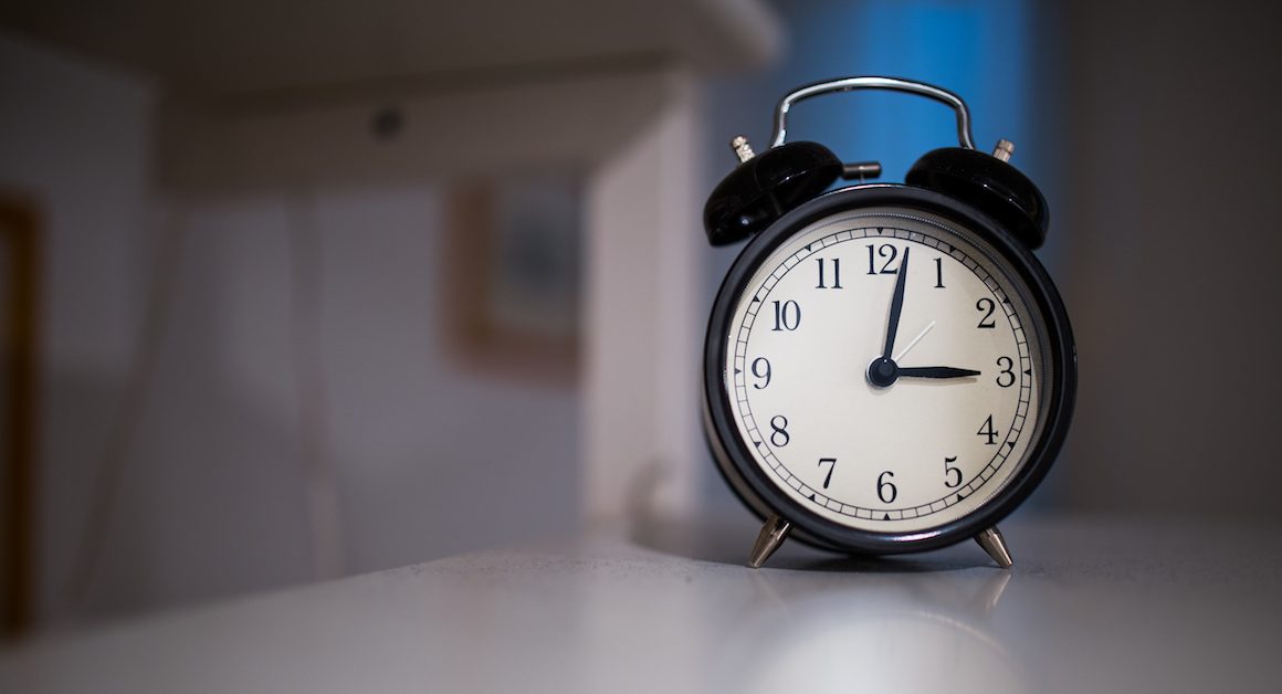 Alarm clock for kinesiology sleep study